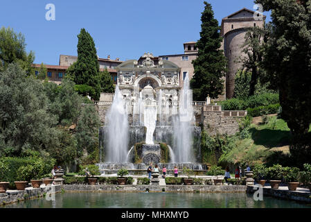 View over the level gardens and fishponds to the spectacular and cascading fountain of Neptune Villa d Este. Tivoli. Italy. Above it on the terrace is Stock Photo
