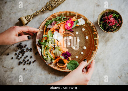 Woman preparing vegan dish Stock Photo