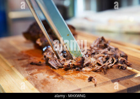 Pulled pork on wooden board Stock Photo