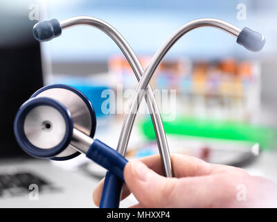 Cropped view of doctor holding stethoscope Stock Photo