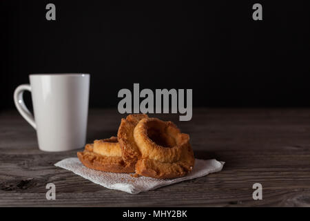 donuts of various size color and shape.  copy space in frame. Stock Photo
