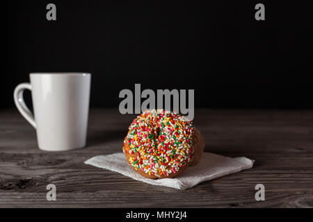 donuts of various size color and shape.  copy space in frame. Stock Photo