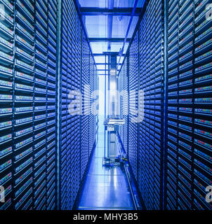 Computer-contolled high bay racking in the pharmaceutical industry Stock Photo