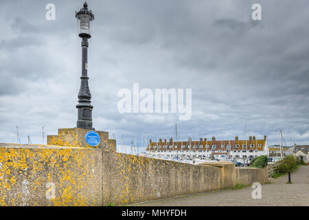 The oldest surviving concrete bridge (built 1877) in England, which is over the mouth of the river Axe by the seaside town of Seaton, Devon, England. Stock Photo