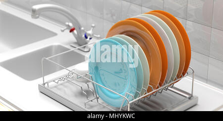 Dish drying rack with colorful clean plates on a white kitchen sink counter. 3d illustration Stock Photo