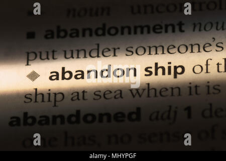 abandon ship word in a dictionary. abandon ship concept. Stock Photo