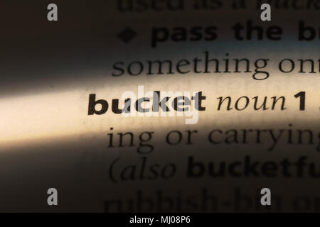 bucket word in a dictionary. bucket concept Stock Photo - Alamy