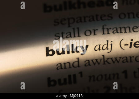 bulky word in a dictionary. bulky concept. Stock Photo