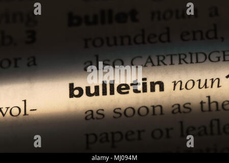 bulletin word in a dictionary. bulletin concept. Stock Photo