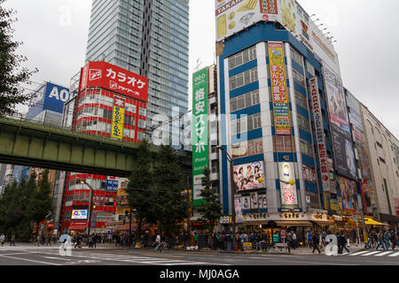 Akihabara streets with stores and pedestrians, a shopping district for video games, anime, manga, and computer goods Stock Photo
