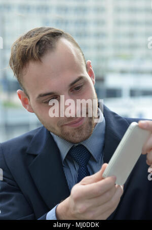 businessman using smartphone Stock Photo