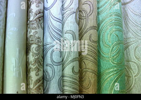 Colorful fabric is used to design out all kinds of clothes for women and men, it can be canvas or cotton, and even silk all suitable for clothes. Stock Photo