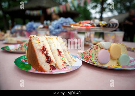 Delicious wedding reception candy bar dessert table full with cakes Stock Photo