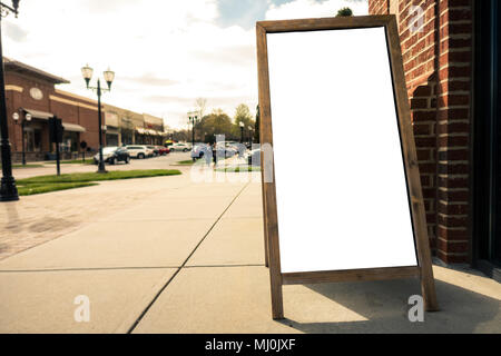 Billboard Rectangular White Mockup City Advertisement front a Store Stock Photo