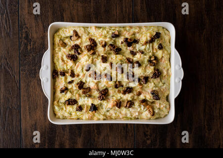 Turkish Carrot Salad with Walnut / Havuc salatasi on a wooden surface. Stock Photo