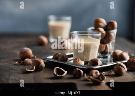 Cream coffee liqueur with hazelnuts, homemade, selective focus, toned image Stock Photo