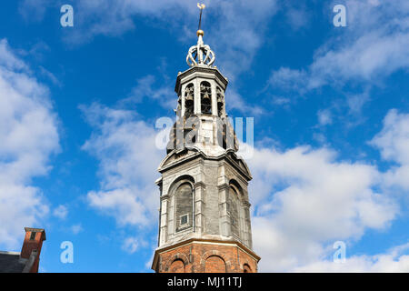 Munttoren (Mint Tower) in Muntplein Square, Amsterdam, where the Amstel river meets the Singel canal. It houses 4 clock faces & a carillon of bells. Stock Photo