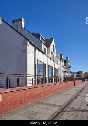 Looking at the rear of the Carnoustie Golf Hotel and up to the 1st Tee of the Championship Course on a clear Spring Day. Carnoustie, Angus, Scotland. Stock Photo