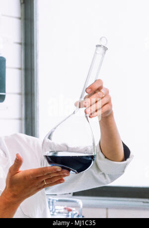 Hands working in a test and analysis labratory Stock Photo