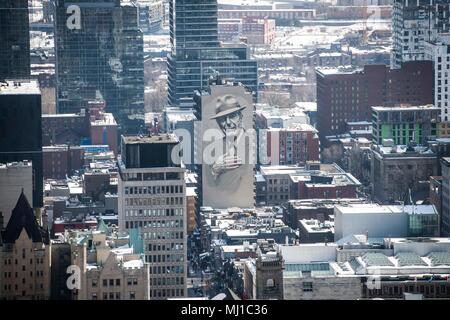 View from the rooftops of Montreal, of a Leonard Cohen Mural painted on a building in downtown Montreal, Canada Stock Photo