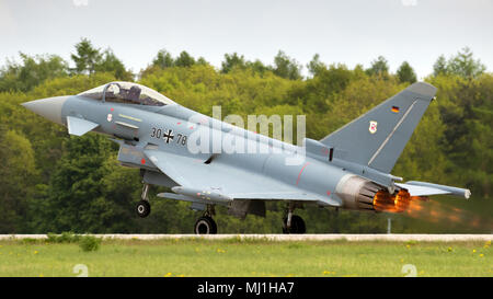 BERLIN - APR 27, 2018: German air force Eurofighter EF-2000 Typhoon fighter jet taking off during the Berlin ILA Air Show. Stock Photo