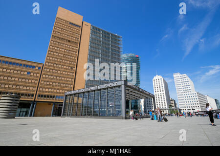 BERLIN - APR 28, 2018: Highrise and entrance to the railway station in Potsdamer Platz. One of the main public square and traffic intersection in the  Stock Photo