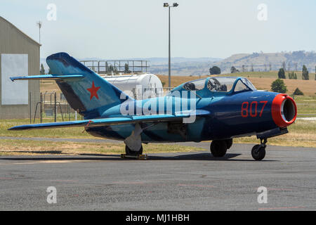 BATHURST, AUSTRALIA - DEC 15, 2012: Vintage Soviet MiG-15 fighter jet on the tarmac of Bathurst airport Stock Photo