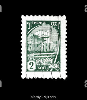 Cancelled postage stamp printed by Soviet Union, that shows Harvest, circa 1961. Stock Photo