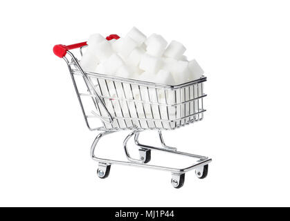 One shopping cart filled with sugar cubes isolated on white. Stock Photo