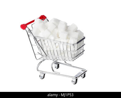 One shopping cart filled with sugar cubes isolated on white. Stock Photo