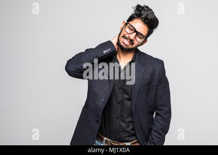 Portrait of a business man having a neck pain. Isolated on white background Stock Photo