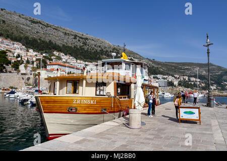 The Lokrum Island passenger ferry, the Zrinski, moored in the Old Port in the Old City of Dubrovnik, Croatia. Stock Photo