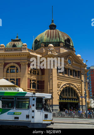 City tram passing Flinders Street Station on Swanston Street, Melbourne, Victoria, Australia Stock Photo