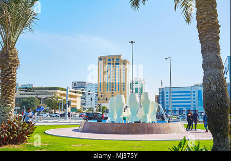 DOHA, QATAR - FEBRUARY 13, 2018: The Water Jar Monument among the greenery of Corniche promenade, on February 13 in Doha Stock Photo