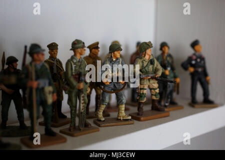 A selection of toy model soldiers pictured on a shelf in Portsmouth, Hampshire, UK. Stock Photo