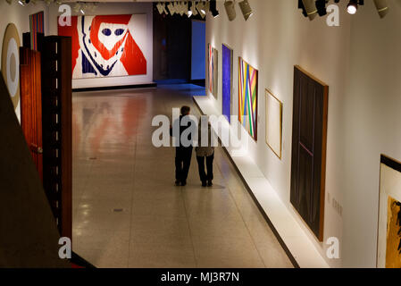 Two people inside the Pavillon Claire et Marc Bourgie in the Montreal Fine Arts Museum Stock Photo