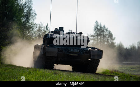 19 April 2018, Germany, Munster: A Leopard 2 A7 tank at the Munster military training area. Photo: Philipp Schulze/dpa Stock Photo