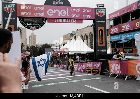 Jerusalem, Israel. 4th May, 2018. A rider crosses the finish line of the 9.7Km Jerusalem Individual Time Trial Stage 1 as the 101st edition of Giro d'Italia, the Corsa Rosa, began today in Jerusalem, history being made with the first ever Grand Tour start outside of Europe. Stock Photo