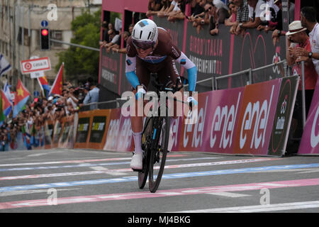 Jerusalem, Israel, 04 May 2018. French cyclist Hubert Dupont who rides for the AG2R La Mondiale team sprints as he crosses the finish line at the end of the 9,7 kilometers individual time-trial during the 1st stage of the 101st Giro d'Italia, Tour of Italy taking place in Jerusalem. The race's 'Big Start', beginning today, marks the first time any of cycling's three major races -- the Giro, Tour de France and Vuelta a Espana -- will begin outside of Europe. Credit: Eddie Gerald/Alamy Live News Stock Photo