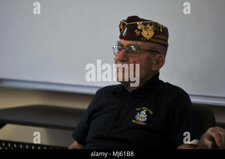 Paul Kerchum, a Chief Master Sgt. (Ret.) with the Air Force and the Army Air Corps, describes his experiences in World War II and his involvement in the Bataan Death March to a crowd of visitors at White Sands Missile Range, New Mexico, March 24, 2018.  Thousands of prisoners of war died in the Bataan Death March, a forced relocation of prisoners in April 1942 through inhospitable jungle, who were denied proper food, water and medical attention.  (U.S. Army Image collection celebrating the bravery dedication commitment and sacrifice of U.S. Armed Forces and civilian personnel. Stock Photo