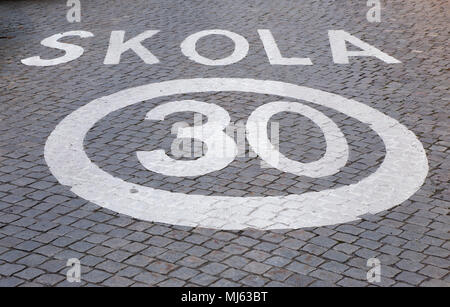 Speed limit 30 outside Swedish School. Stock Photo