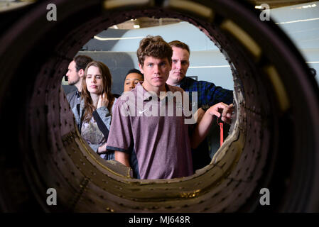 David Mongeau, a Mississippi State University Aircraft Propulsion student, examines the shell of a T-38C Talon engine April 4, 2018, on Columbus Air Force Base, Mississippi. An aerospace engineering student will spend over 1,000 hours in their classroom learning the different components of aircraft. (U.S. Air Force Image collection celebrating the bravery dedication commitment and sacrifice of U.S. Armed Forces and civilian personnel. Stock Photo