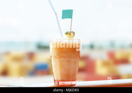 Coctail pina colada on ocean happy day background Stock Photo