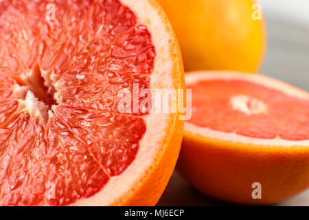 Detail of red grapefruit cut in half. Stock Photo