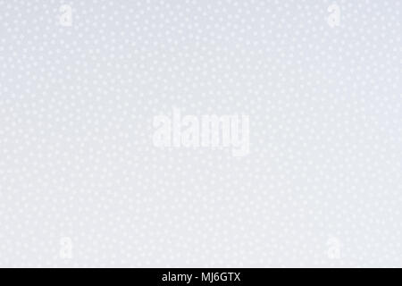 Bright paper with white spots and dots texture background. Stock Photo