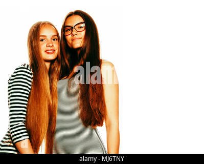 two young workers isolated on white, wearing same dresses in strip, glasses Stock Photo