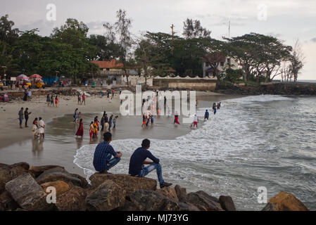 Kochi (Cochin), Kerala / India - April 15 2018: Residents of Kochi are celebrating the local Vishu festival and dipping into sea. Stock Photo