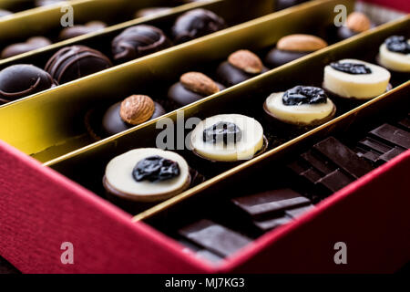Assortment of Chocolates in box (selection focus) Stock Photo