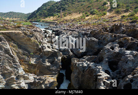 Pulo do Lobo (Wolf's leap) waterfall is a cascades of river Guadiana which water finds its way through limestone rocks, Alentejo, Portugal Stock Photo