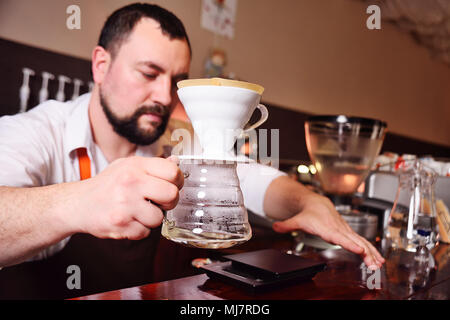 Drip coffee or pour-over coffee on the scale and professional coffee  equipment Stock Photo - Alamy